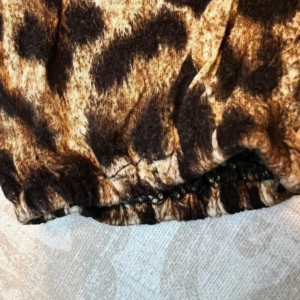 Michael Kors animal print 3/4 sleeve top with elastic hem  Size M